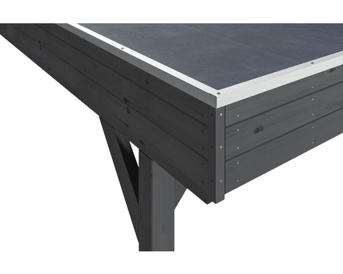 Vue détaillée d''un abri de jardin avec toit plat et structure en bois