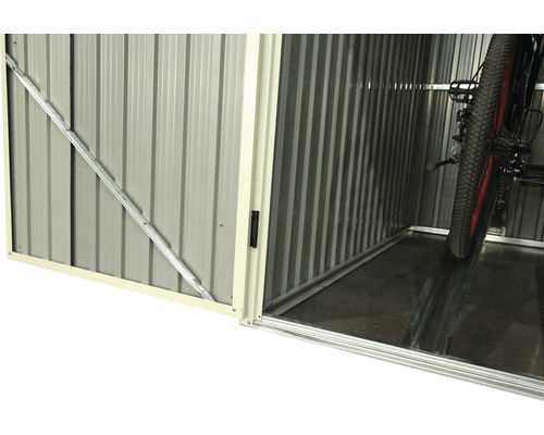 Vue intérieure d''un abri à vélos en métal avec un vélo