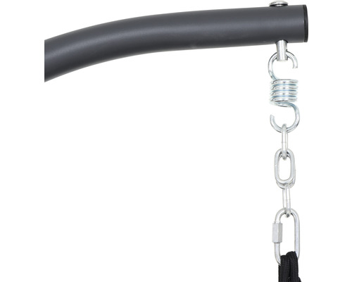 Gros plan d''un dispositif de suspension avec ressort et chaîne