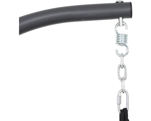 Gros plan d''un dispositif de suspension avec ressort et chaîne