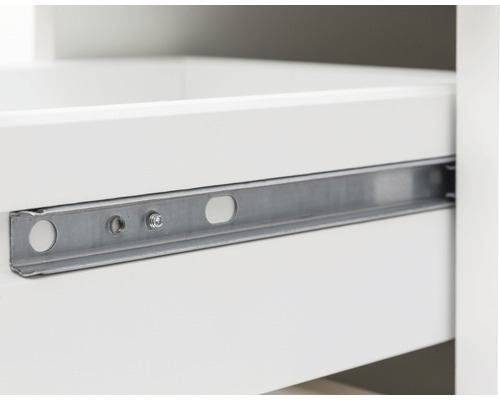 Gros plan d''un tiroir avec rail métallique