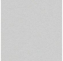 Nahaufnahme einer hellen, strukturierten Tapete.