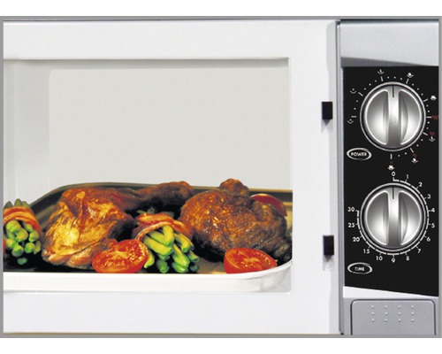 Four à micro-ondes avec des aliments à l''intérieur