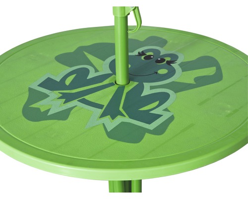 Detailansicht eines runden, grünen Kindertisches mit Froschmotiv