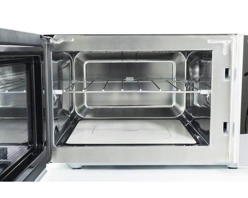 Vue intérieure d''un four à micro-ondes avec grille et plaque en pierre