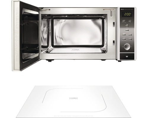 Four à micro-ondes avec porte ouverte et plaque à induction