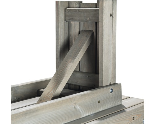 Vue détaillée d''une table de jardin en bois avec des supports