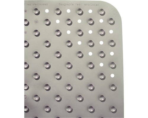 Gros plan d''un tapis de douche avec ventouses