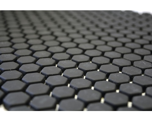 Gros plan de carreaux de mosaïque hexagonaux noirs