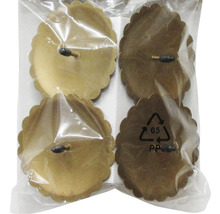 Quatre patins pour meubles avec bordure florale dans un emballage