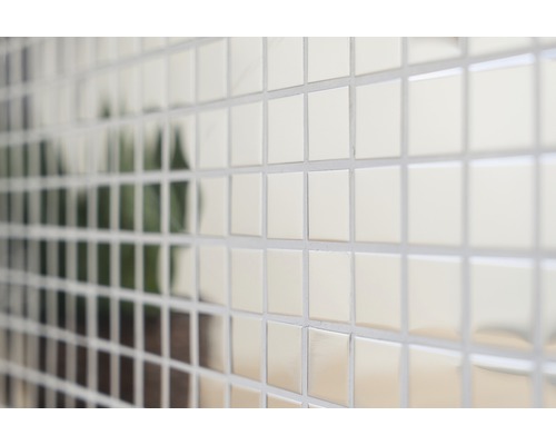 Gros plan d''un mur avec des carreaux de mosaïque carrés