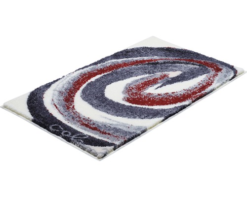 Tapis avec motif abstrait en forme de spirale