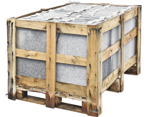 Caisse en bois avec plaques de pierre sur une palette