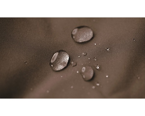 Gros plan de gouttes d''eau sur un tissu hydrofuge