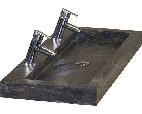 Aufsatzwaschbecken aus Stein mit zwei Armaturen