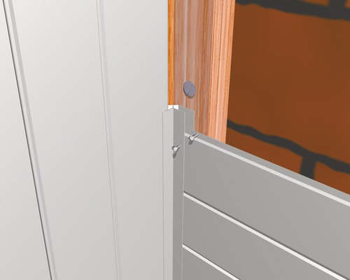 Vue détaillée du montage d''une clôture avec des poteaux en bois et des vis