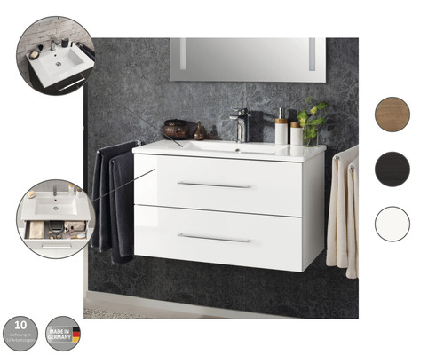 Salle de bains avec meuble sous-vasque blanc, lavabo et deux tiroirs