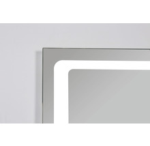 Vue détaillée d''un miroir éclairé avec cadre