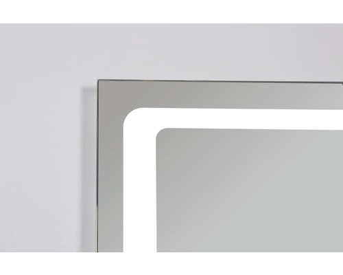 Vue détaillée d''un miroir éclairé avec cadre