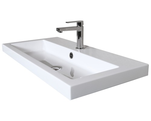 Vasque à poser blanche en céramique avec robinet