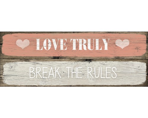 Panneau décoratif en bois avec les inscriptions « Love Truly » et « Break the Rules ».