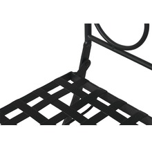 Vue détaillée d''une étagère métallique noire avec surface de rangement tissée.