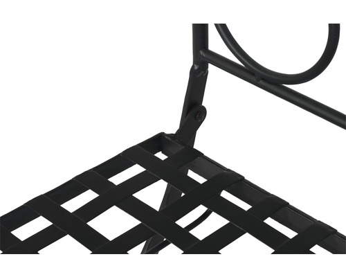 Vue détaillée d''une étagère métallique noire avec surface de rangement tissée.