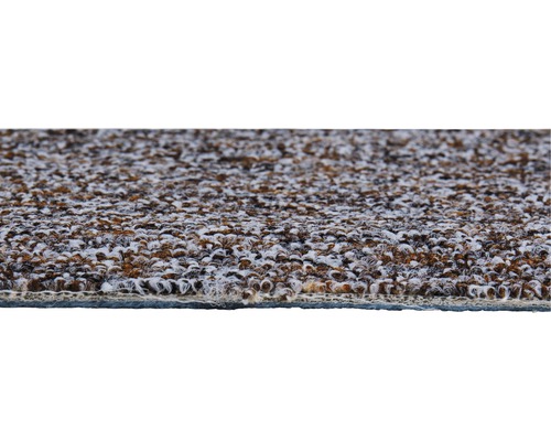 Detailaufnahme eines Teppichs mit Noppenstruktur.