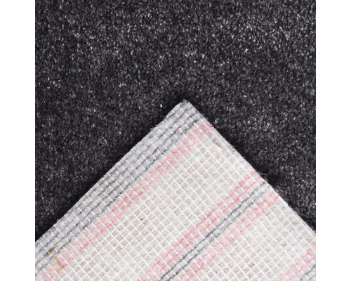 Vue détaillée d''un revêtement de sol en moquette grise avec envers textile