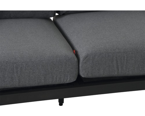 Gros plan d''un canapé de jardin gris avec cadre