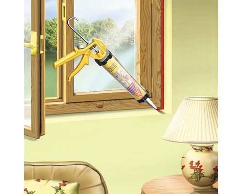 Du mastic acrylique est appliqué sur un cadre de fenêtre à l''aide d''un pistolet à cartouche.