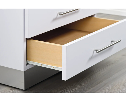 Commode blanche avec tiroir en bois ouvert