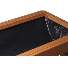 Vue détaillée d''un potager surélevé avec film