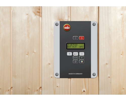 Weka Logo auf einer Steuerungseinheit für eine Sauna an einer Holzwand