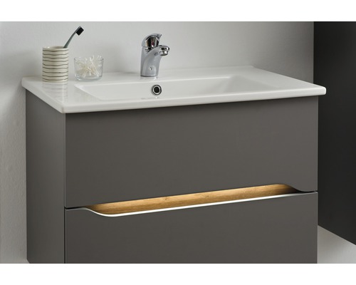 Waschtischunterschrank mit Becken, Armatur, Zahnbürstenhalter und Wattestäbchen