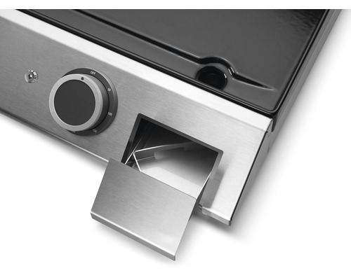 Vue détaillée d''une plaque de gril avec bouton rotatif et bac de récupération des graisses