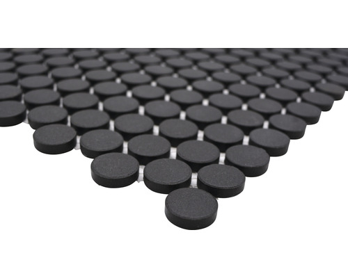 Mosaikfliese mit runden, dunklen Steinen