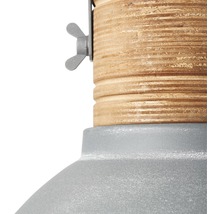 Detailansicht einer Lampe mit Holzfassung und Schraube