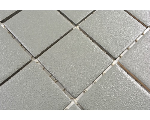 Gros plan de carreaux de mosaïque gris