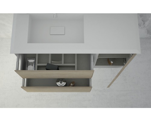 Meuble sous-lavabo avec tiroirs et compartiments ouverts