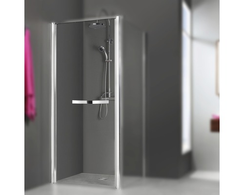 Cabine de douche avec pomme de douche et douchette dans la salle de bain