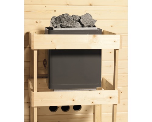 Saunaofen mit Steinen in einem Holzrahmen