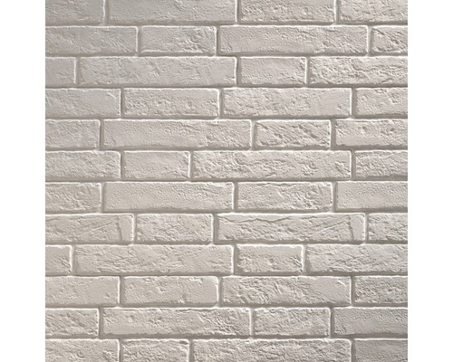 Mur de briques claires en arrière-plan pour les projets de construction