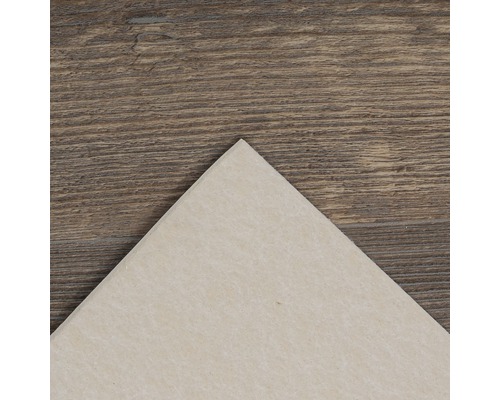 Carreau de sol beige sur fond en bois