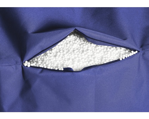 Gros plan d''un pouf avec fermeture éclair et billes de polystyrène