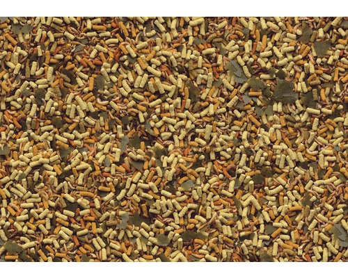 Gros plan sur des granulés et flocons pour poissons