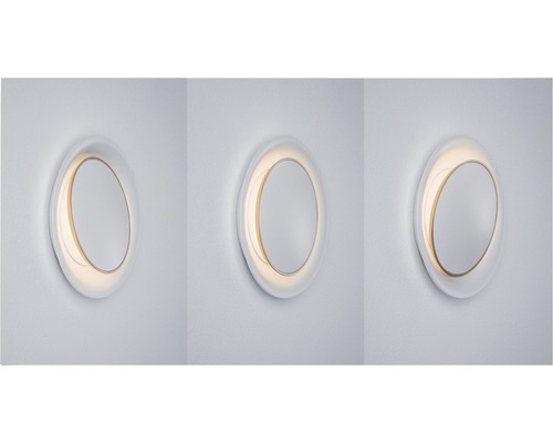 Drei ovale Wandleuchten mit integrierter Beleuchtung an einer Wand