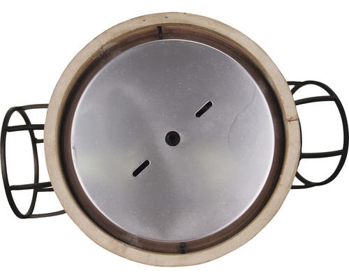 Vue de dessus d''un gril en céramique avec plaque métallique et poignée