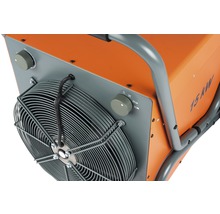 Detailansicht eines elektrischen Heizgeräts mit Ventilator, Temperaturregler und Schutzgitter.