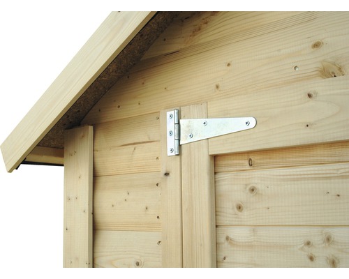 Vue détaillée d''une cabane en bois avec une charnière en T sur la porte